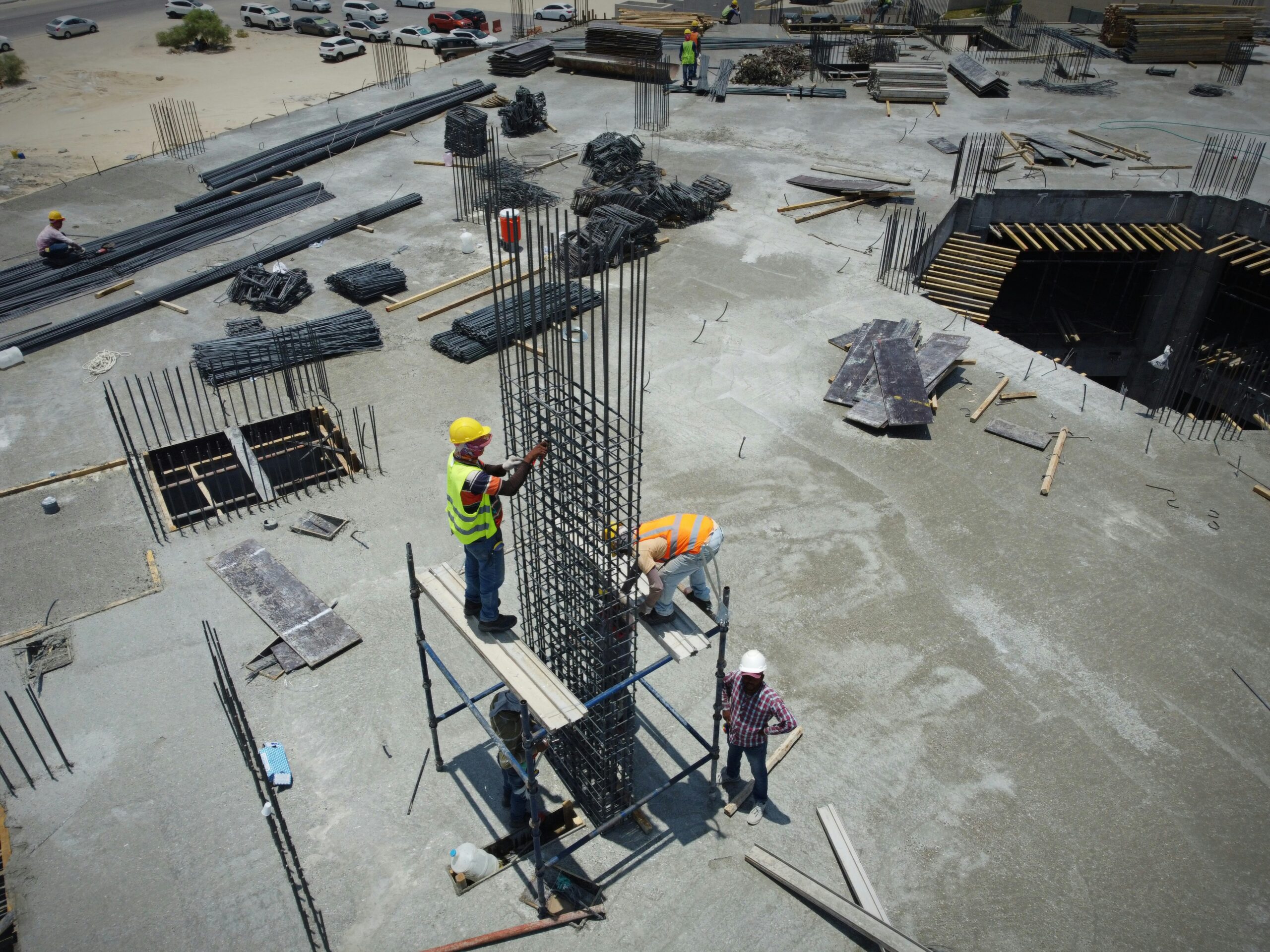 Construction site with crane showing Samsher Buildcon construction work